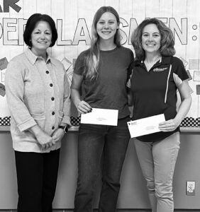 Anna Layng, middle, who was named student of the month for May at Paxton-Buckley Loda High School, poses with Nancy Hofer, left, of the Bank of Pontiac, which sponsors the award, and PBL High School math teacher Sheila Pickens, who nominated Layng for the award.