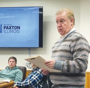 Clark Dietz Senior Client Advisor Mike Livermore speaks to members of the Paxton City Council last year, as Superintendent of Streets and Alleys Jesse Houtzel looks on. Will Brumleve/Ford County Chronicle