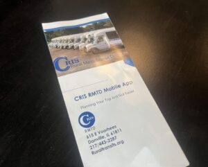 A flyer promotes the CRIS Rural Mass Transit District, which has expanded its public transportation services into Ford County. One-way, in-county rides cost $5. Will Brumleve/Ford County Chronicle