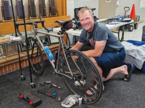Greg Oderich of Denver, Colo., puts up his bike during a stop in Gibson City that was part of the Gold Star Mission’s ninth annual Gold Star 500. Mindy Basi/Ford County Chronicle