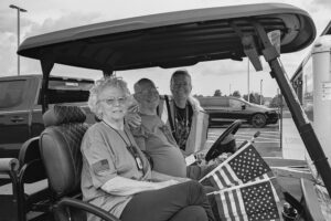 Diane and Russell Coulter of Gibson City, foreground, were among the Illinois Gold Star families who stopped in Gibson City during the Gold Star 500 bicycle ride. Vonda Rodgers, back, volunteers with the Gold Star Mission. Mindy Basi/Ford County Chronicle